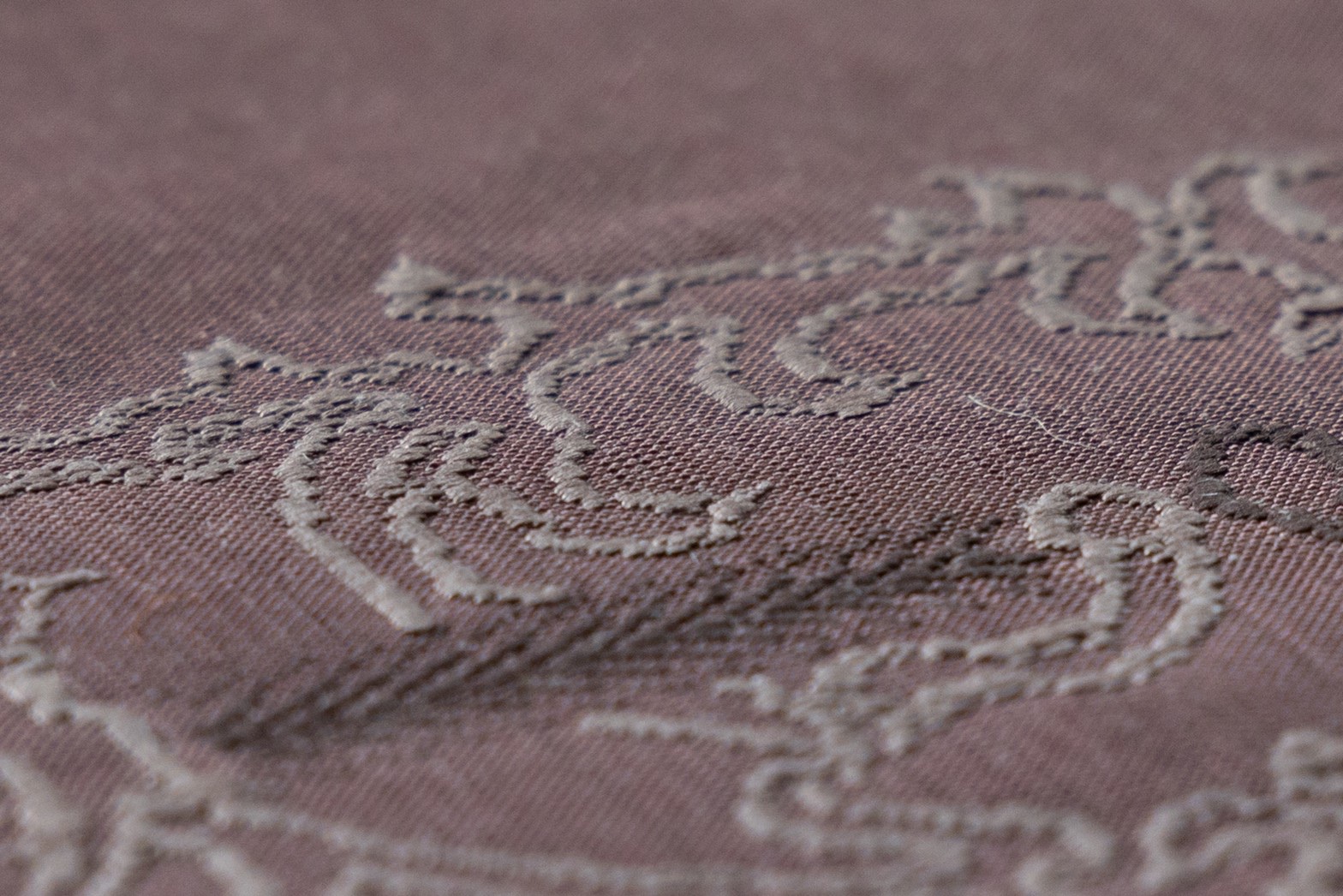 close-up of brown cloth with stitching