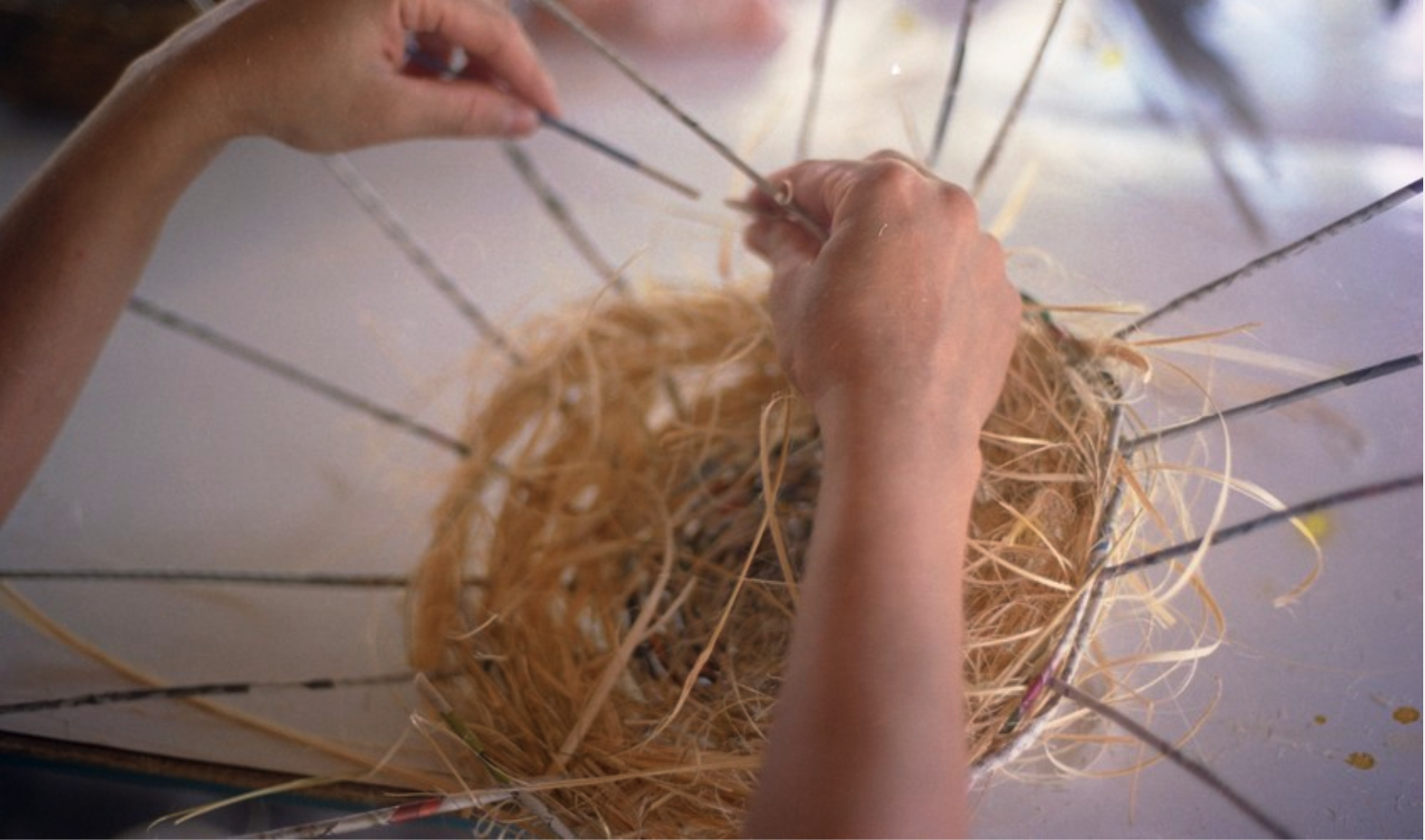 Nilofar Akmut weaves a basked at Womanifesto Workshop 2001